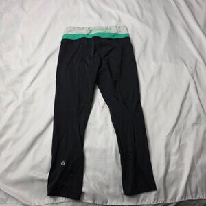 Lululemon Black Cropped Leggings with Green Floral Waistband – Size 4